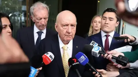 Indecent Assault Charges Against Top Australian Radio Host Lessened